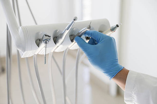 Professional Tooth Extraction technician working in Westwood, MI
